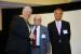 Professor Hsing-Wei Chu, Program Committee Co-Chair and Dr. Nagib Callaos, General Chair, giving Professor T. Grandon Gill a plaque "In Appreciation for his Intellectual Accomplishments and for Delivering a Great Keynote Address at a Plenary Session."